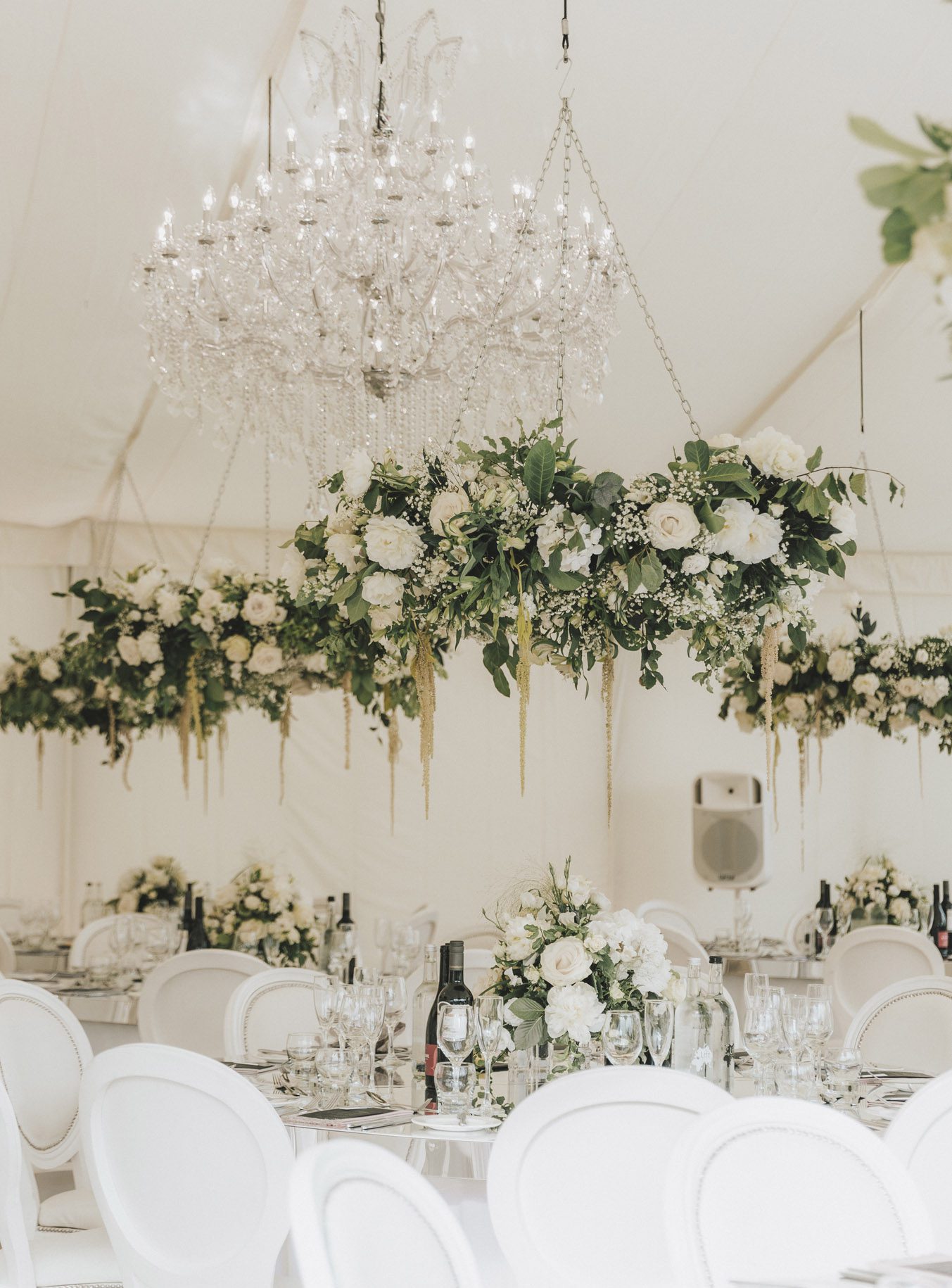 Hever_3 Flowers hanging over a table in a marquee